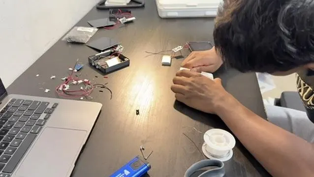 An intern build session in the workshop
