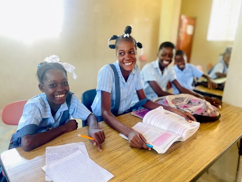 Students in a classroom at a Brighten Haiti partner school